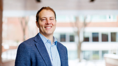Dean David Deming's outdoor headshot.