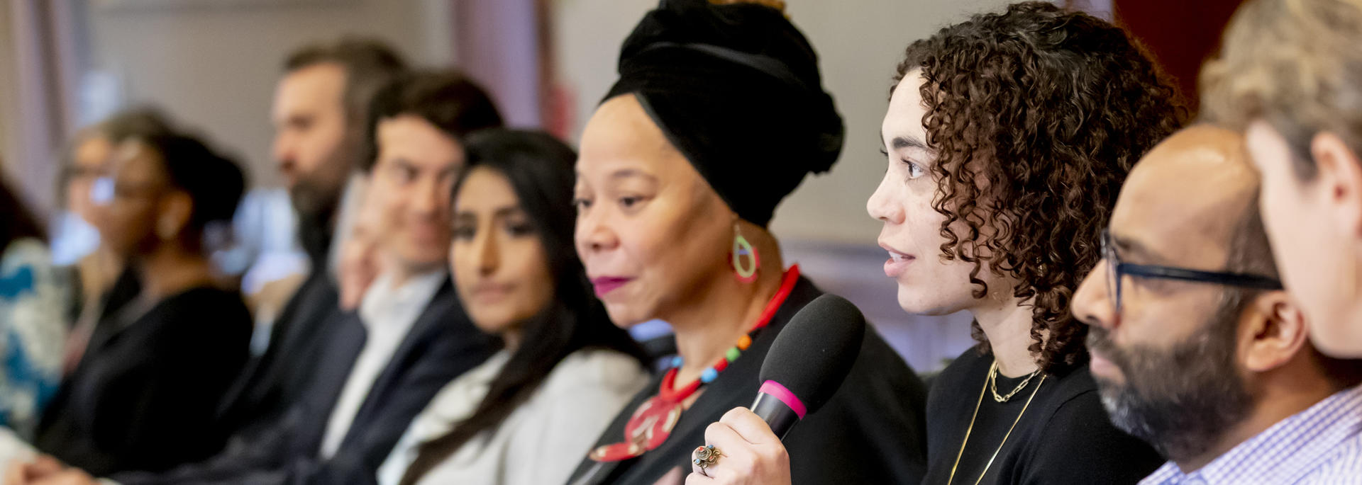 Group of Harvard faculty at an event.