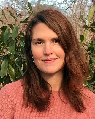 Ariel Sroka's headshot.