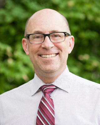 Jim Moylan's headshot.
